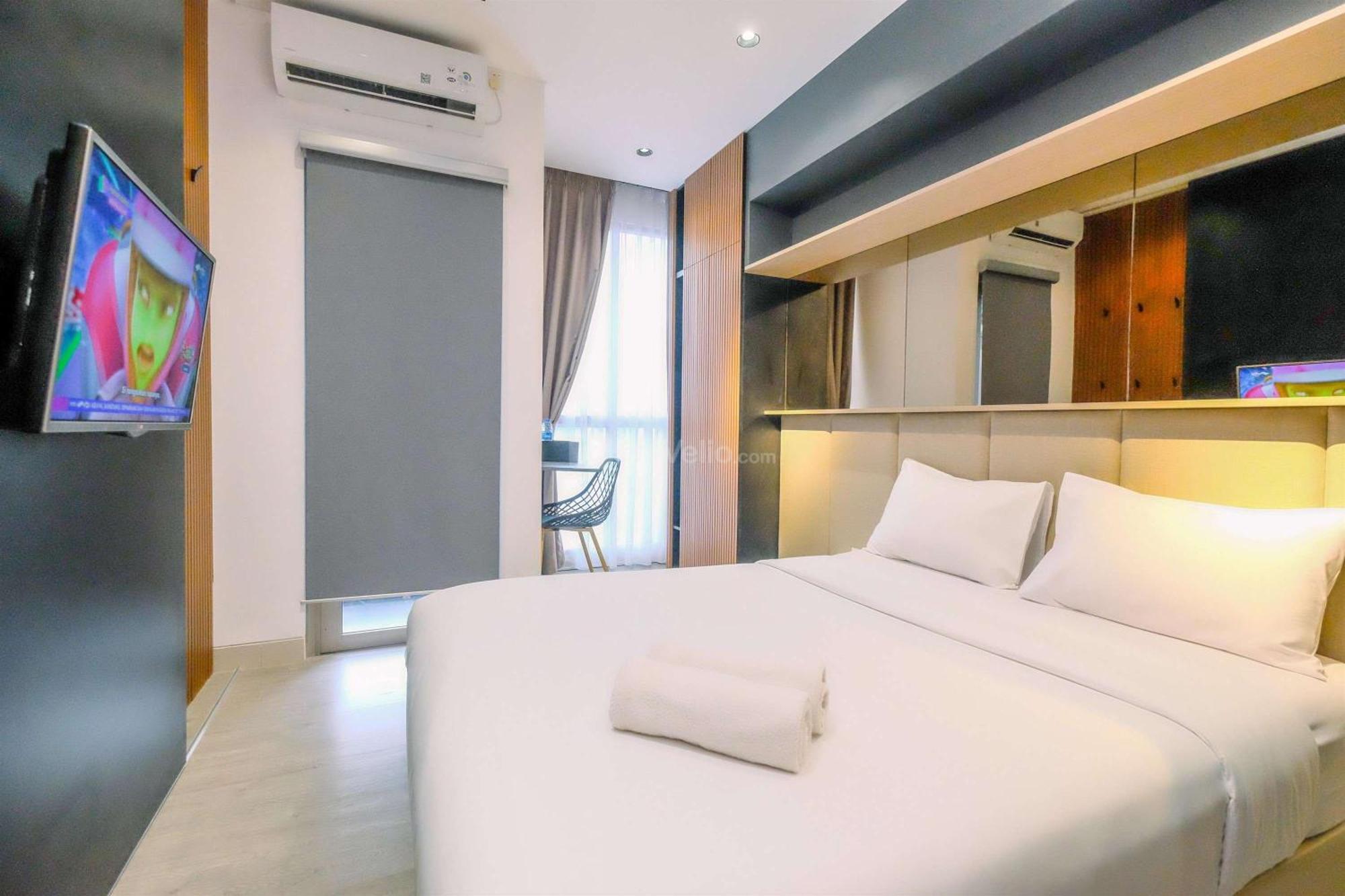 Appartement Minimalist And Comfy Ciputra World 2 By Travelio